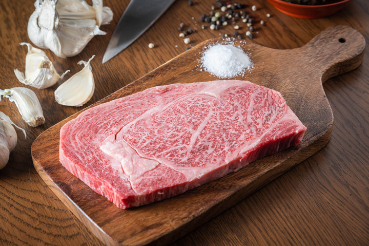 Japanese Wagyu A5 on wooden cutting board